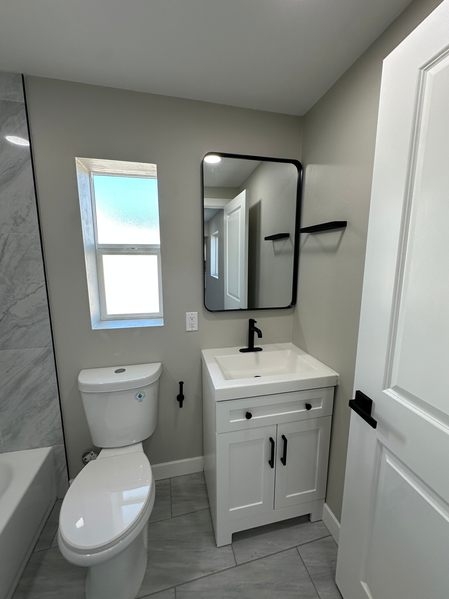 All-new modern bathroom with designer finishes - 1331 W Speedway Blvd
