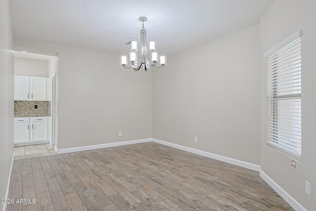 Building Photo - 15569 W Gelding Dr