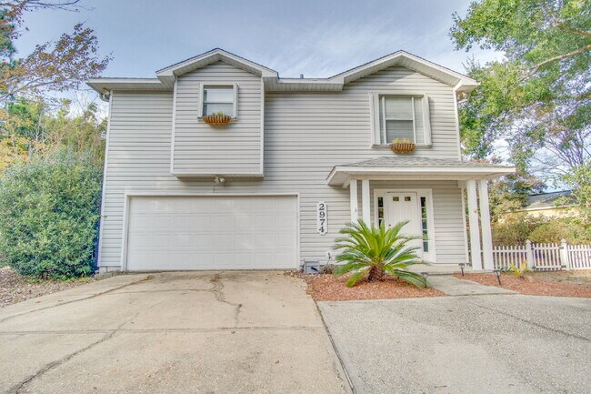 Building Photo - Live the Gulf Breeze Waterfront Life – Dock, Canal Access & Boat Lift!