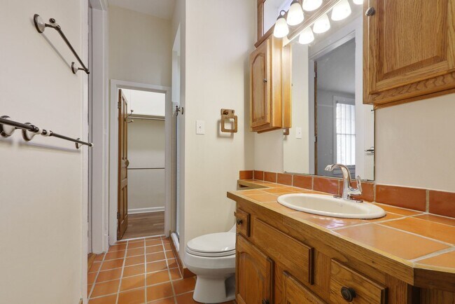 Building Photo - Fabulous University Duplex with gleaming floors and stained glass.