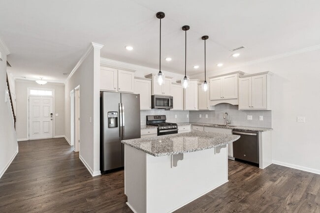 Building Photo - Stylish 4-Bedroom Townhome with Backyard O...