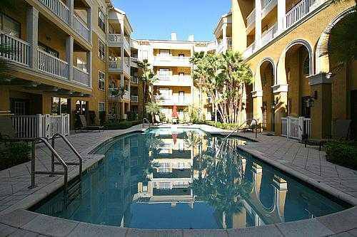 Building Photo - Gorgeous 1/1 with all tile floors and Balcony!