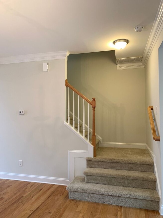 Building Photo - PRIME LOCATION, 3 Bedrooms Suites Apex TH Near HWY, Schools, Shops and Community Amenities!