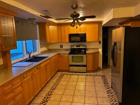 Kitchen w/ custom tile job - 4220 S Lynne Ln