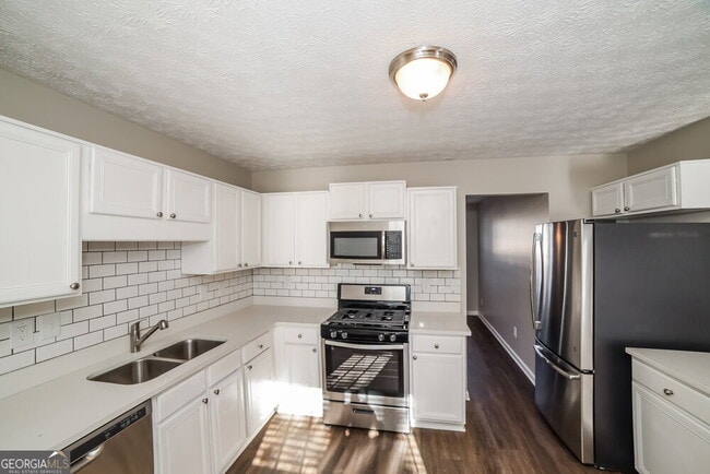 Building Photo - 7013 Grinder Dr