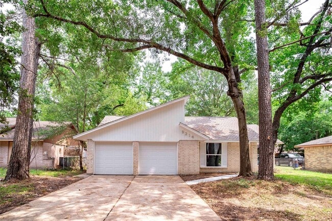 Building Photo - 9214 Woodland Oaks Dr