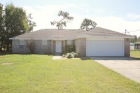 Building Photo - Spacious 4BR/2BA Brick Home in Navarre – ...