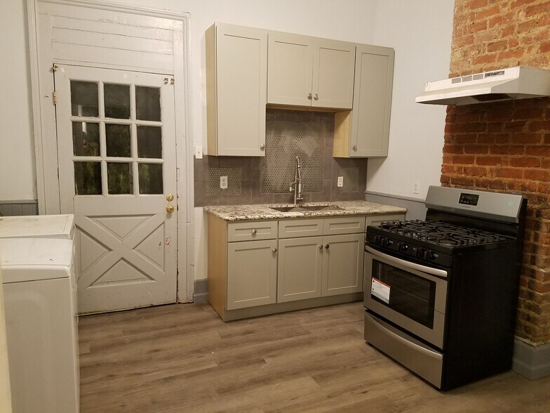 Kitchen: View from Bathroom - 921 N Miro St
