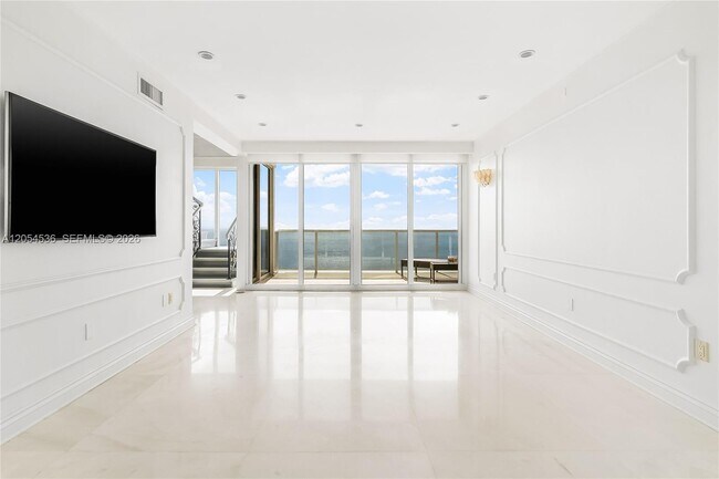 Building Photo - 19111 Collins Ave
