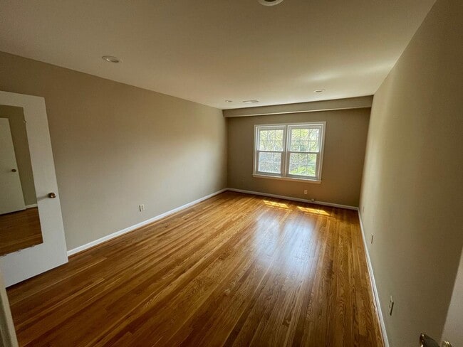 Building Photo - A fully updated Four Bedroom, Three and On...