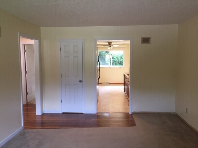 Living room view with coat closet. - 12601 Blue Ridge Ext