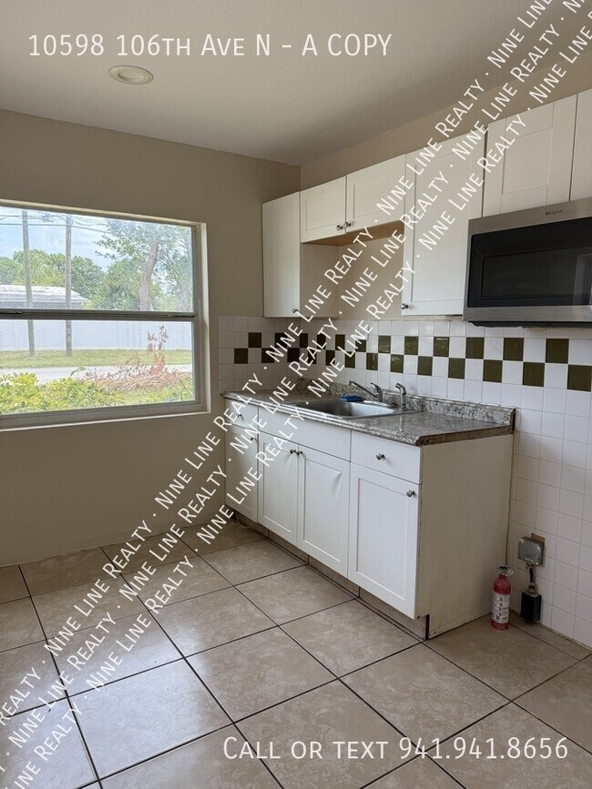 Building Photo - 10598 106th Ave N