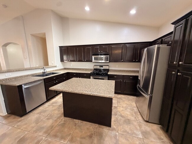 Building Photo - *NEW* Custom Paint/*NO* Carpet 3 BD/2 Bath Spacious Surprise Home!