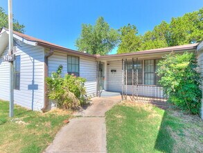 Building Photo - 9706 N Garnett Dr