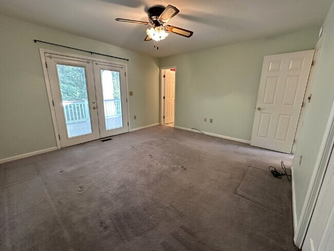 Building Photo - LEASE PENDING! 3-Bedroom Split Level in Peaceful Wooded Setting