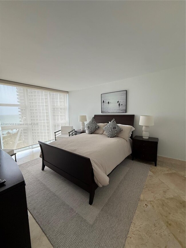 Building Photo - 10275 Collins Ave