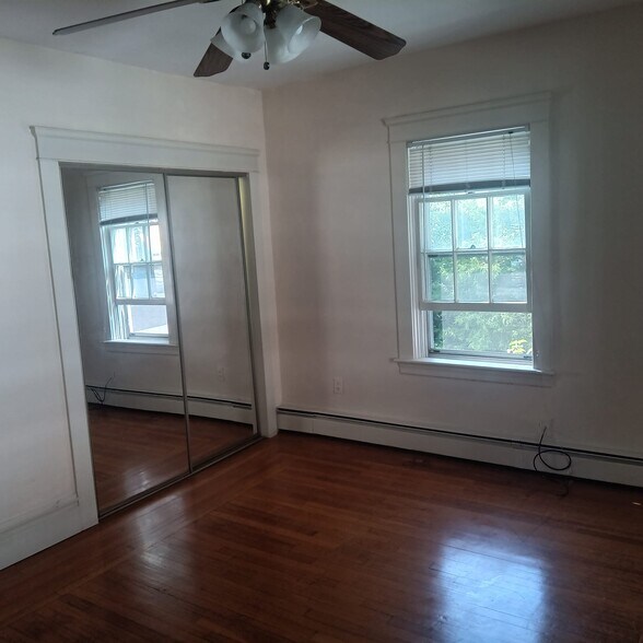 Large master bedroom with ceiling fan - 29 Ogden St