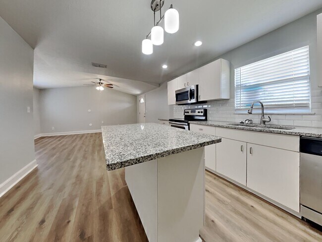 Building Photo - Newly Renovated Single Family Home | 3 BR/2BA | Fenced Backyard