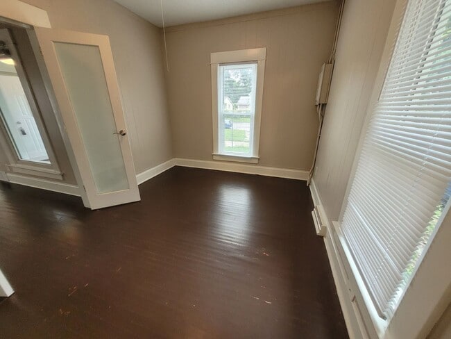 Building Photo - Two bedroom home with partially fenced yard!