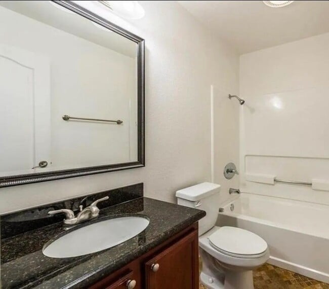 Building Photo - Beautiful 2-Bedroom Condo with Serene Wate...