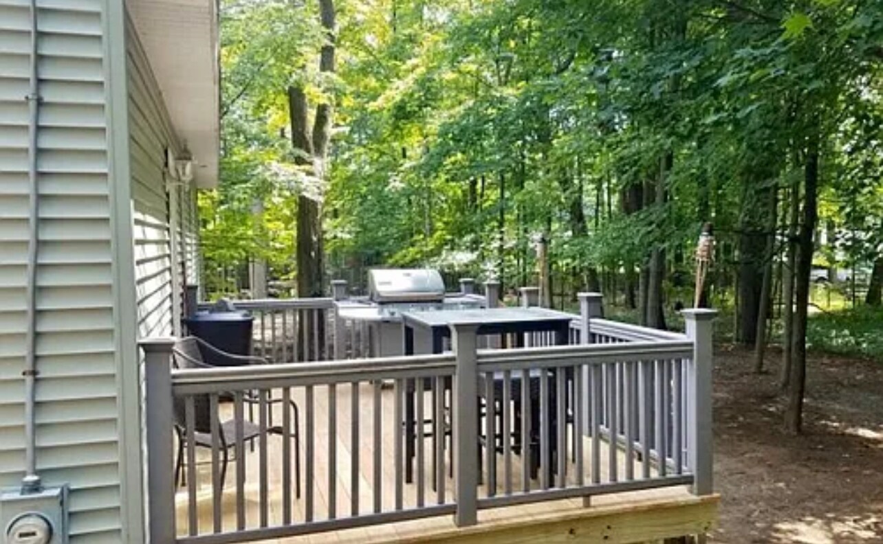 Back deck and partial view of yard - 21 Loughberry Rd S