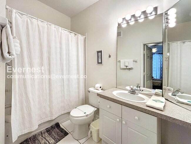 Building Photo - Modern 2-Bed Condo with Balcony / Furnished or Unfurnished / Pet Friendly / Available Now!