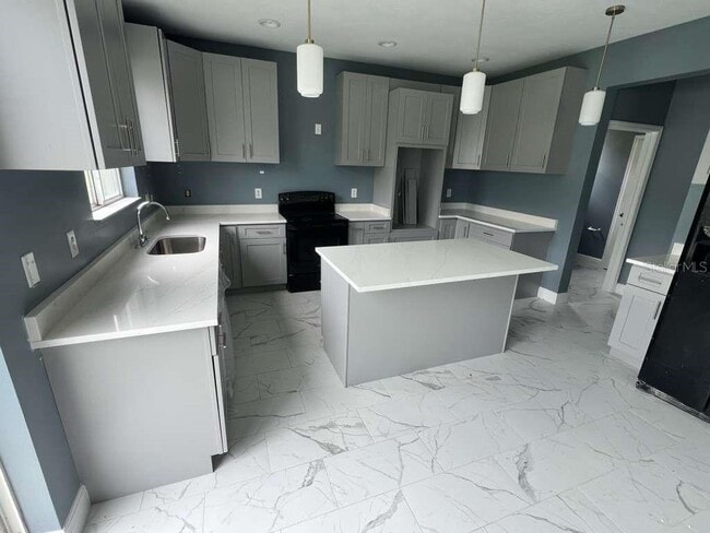 Building Photo - 545 1st Cape Coral Dr