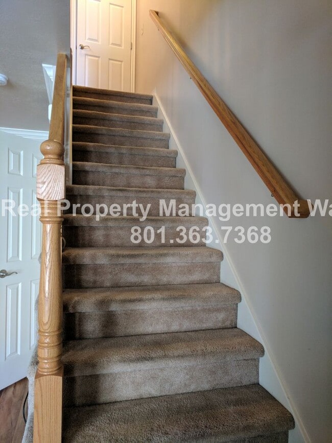 Building Photo - Pet Friendly 2 Bed 1.5 Bath Condo in Midvale