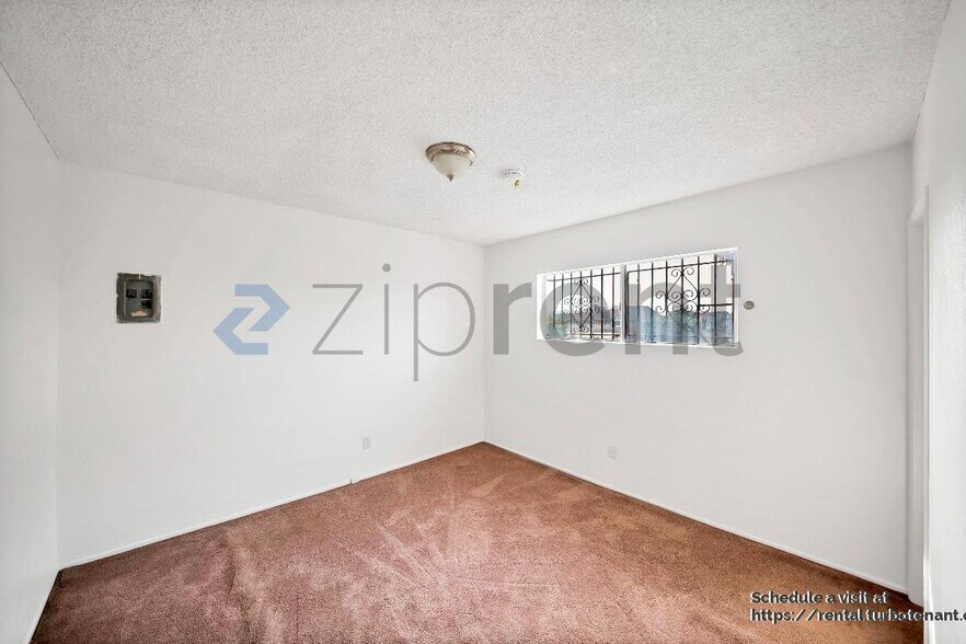 Building Photo - 2458 Normandie Ave