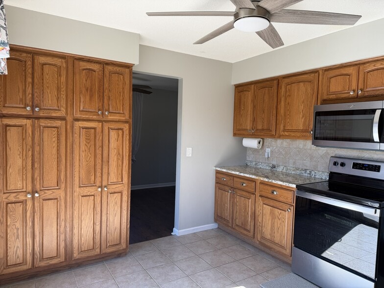 Sunny kitchen with plenty of storage - 3309 Winston Dr