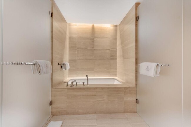 Building Photo - 9703 Collins Ave