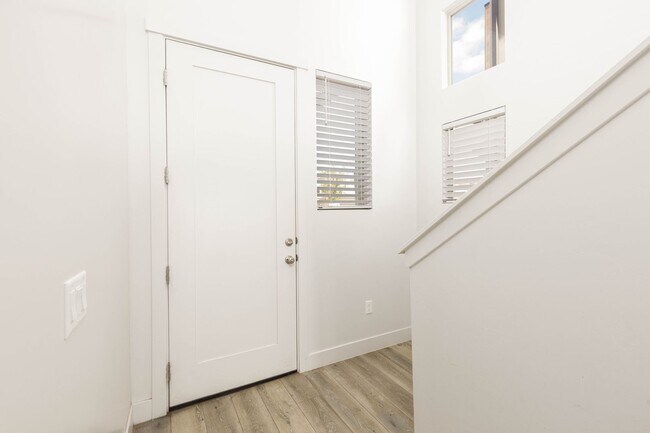 Building Photo - 4 bed | 2 1/2 bath | 2 car garage in Desert Canyon with washer/dryer/fridge