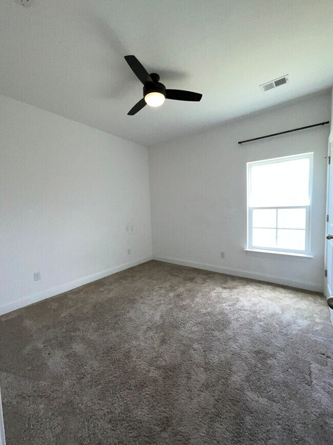 Building Photo - "Spacious 4-Bed Oasis with Stunning Lake V...