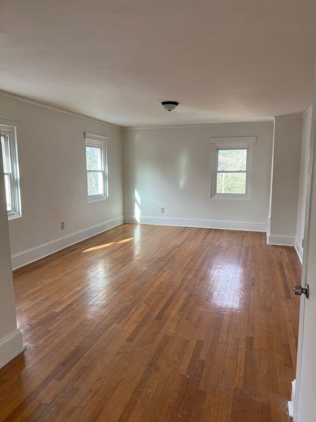 Building Photo - Spacious 4-Bedroom Brick Home with Hardwood Floors and Walk-In Closet