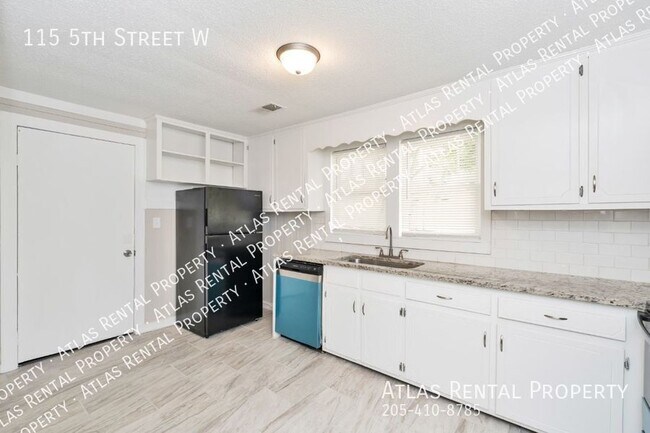 Building Photo - 115 5th St W