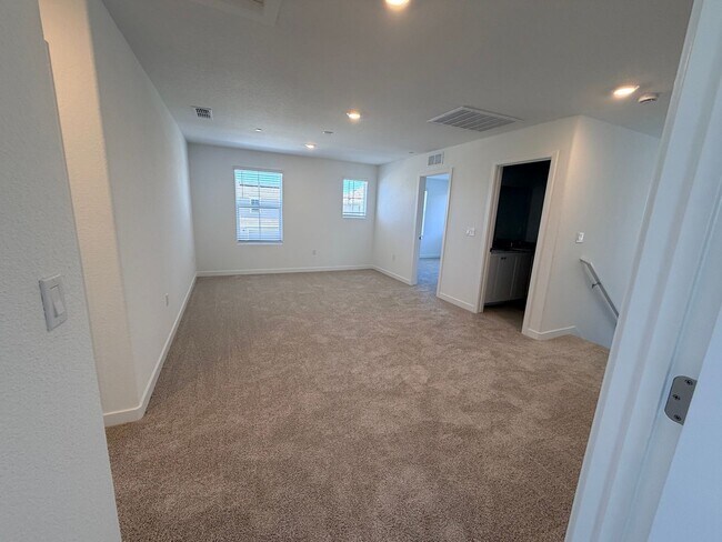 Building Photo - **Welcome to this beautifully designed 4-bedroom, 3-bathroom home offering modern living space.**