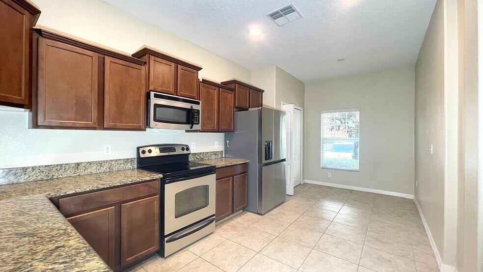 Building Photo - 4167 Shade Tree Ln