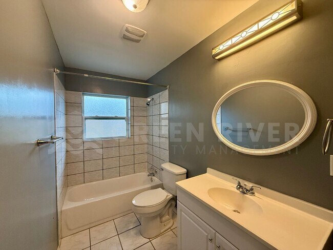 Building Photo - Fully Renovated 2BR Brick Home with Vaulted Ceilings & Backyard Retreat!