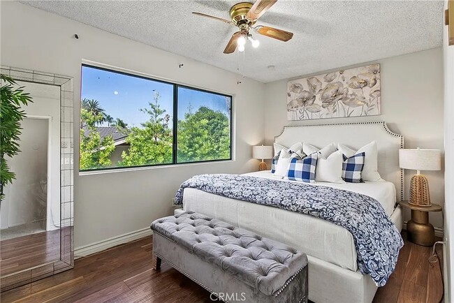 Bedroom fits a king size bed, with beautiful views of trees out the window. - 725 Coronado Ave