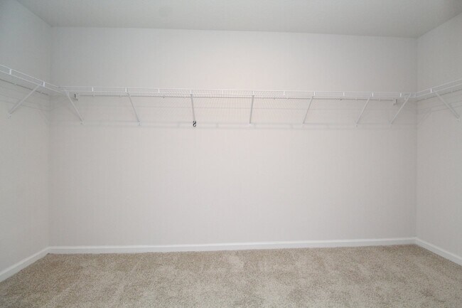 Building Photo - Spacious 4-Bed, 2-Bath East Milton Home with 2-Car Garage, Open-Concept Kitchen, Primary Suite, F...