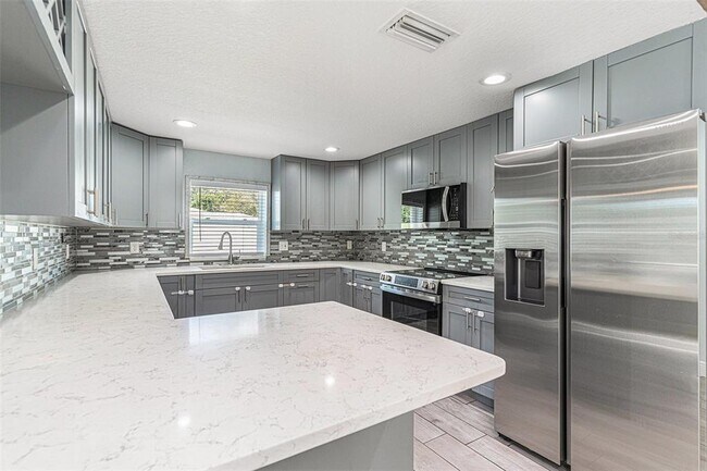 Building Photo - 3602 E 33rd Ave