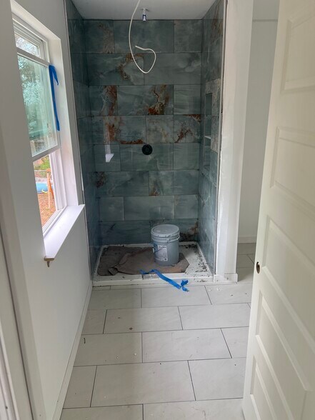primary bath with rain shower and double van - 2629 Heartwood Rd