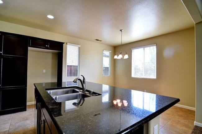 Building Photo - Fantastic Harlan Patio Home with Fenced Fr...