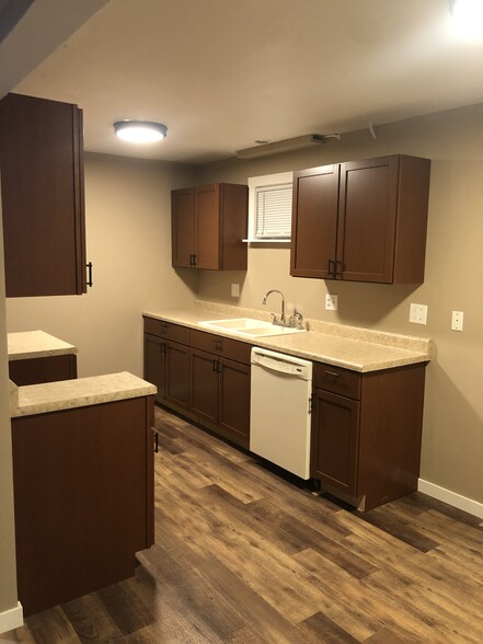 Kitchen - New Cabinets, counter, Flooring - 3207 N Peoria Ave