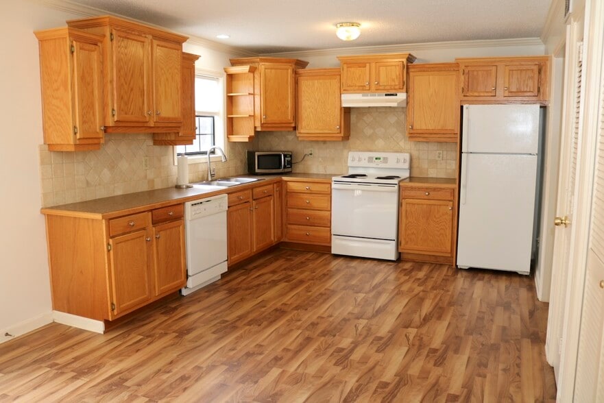 You likely will not find a kitchen this large in a townhouse of this size. - 7005 Sand Wedge Cir