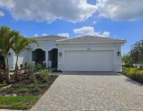 Building Photo - Beautiful Seasonal Englewood Villa- DOG FRIENDLY - new construction with Community Pool! – Locate...