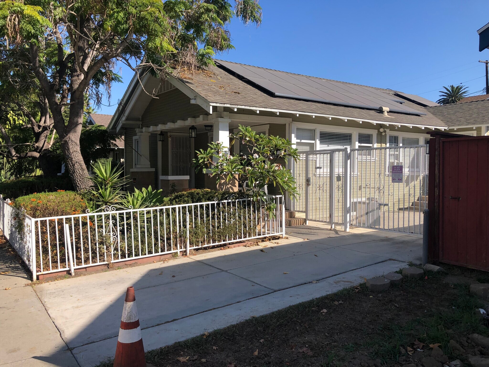 gate next to house, entrance to parking - 766 Temple Ave