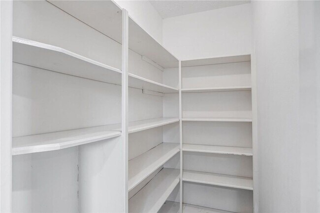 Building Photo - Welcome to this fully remodeled 4/2/2 brick home near Lake Conroe! With new AC/heat, roof, water ...