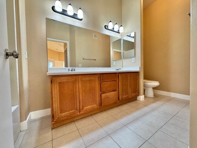 Building Photo - Welcoming 2 Bedroom home with private balcony located in South Las Vegas Community