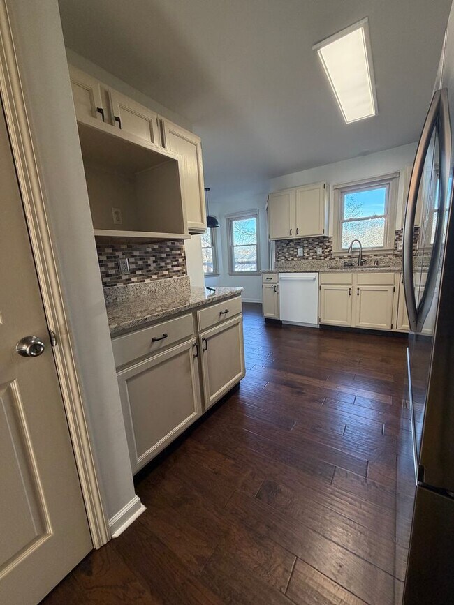 Building Photo - 4 Bedrooms with Finished Basement and Bonus Room!